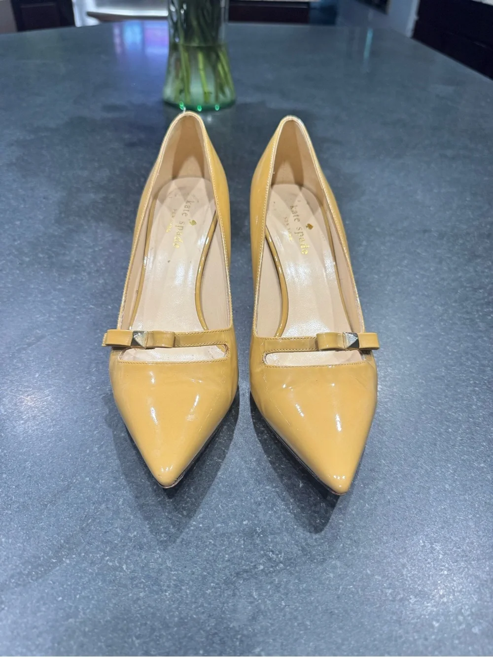 kate spade Tan Patent Pointed-Toe Pumps with Bow Detail and Red heel